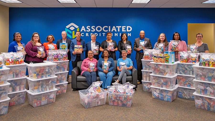 ACU Employees with Donated Backpacks