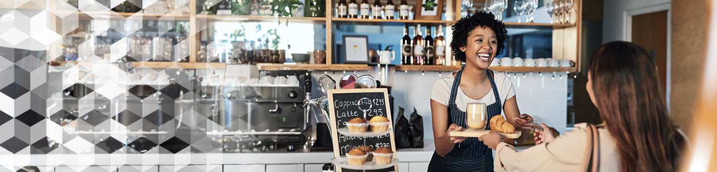 Cafe Employee Giving Order To Customer