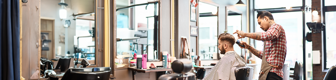 Barber Cutting a Customer's Hair