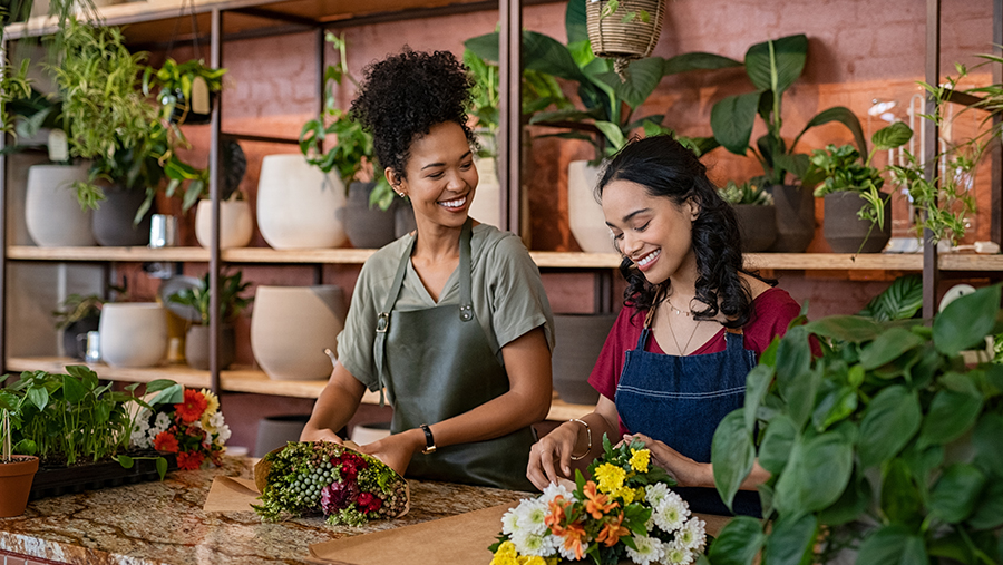 Two Florists completing flower order