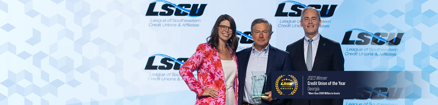 President/CEO Lin Hodges with LSCU Award and Officials