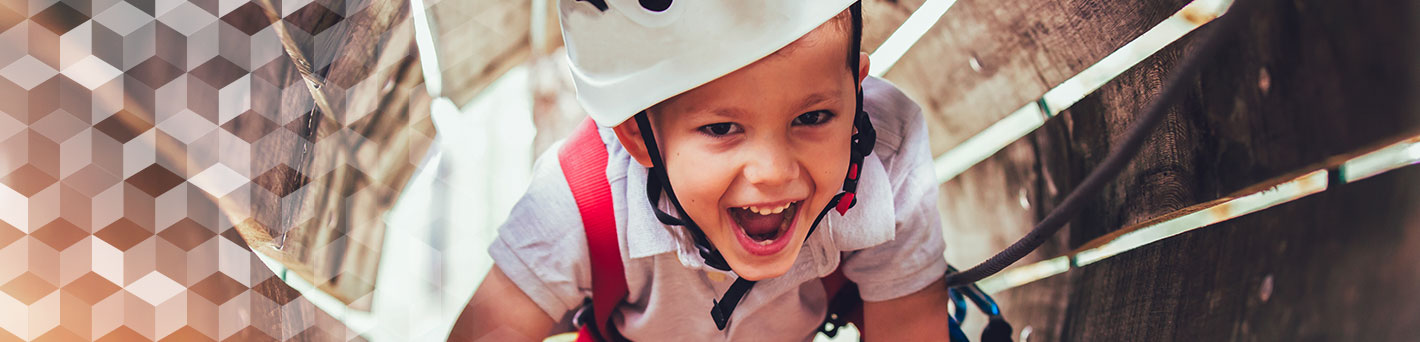 Young boy playing outside.