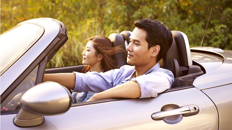 Couple riding in car