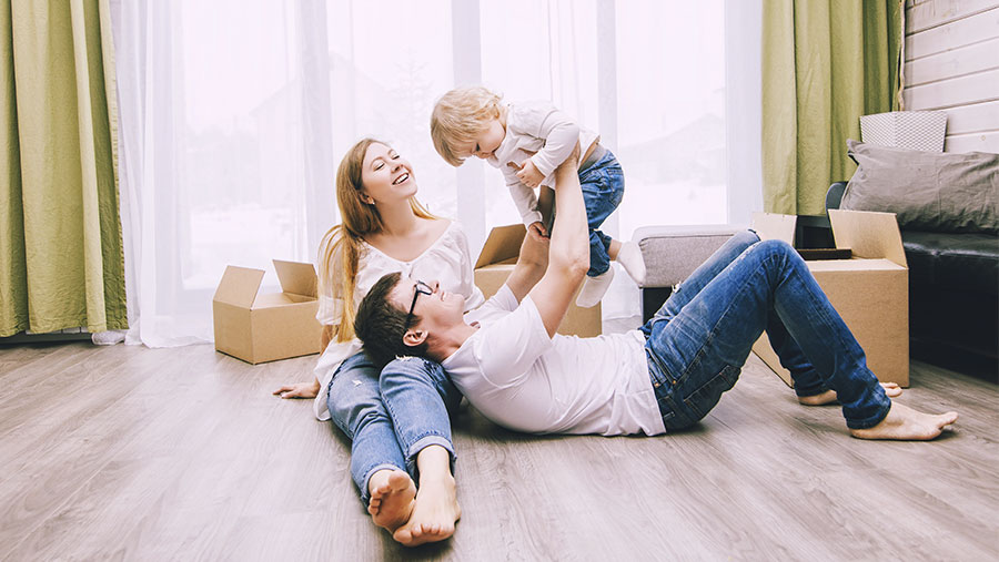 Parents playing with their kid