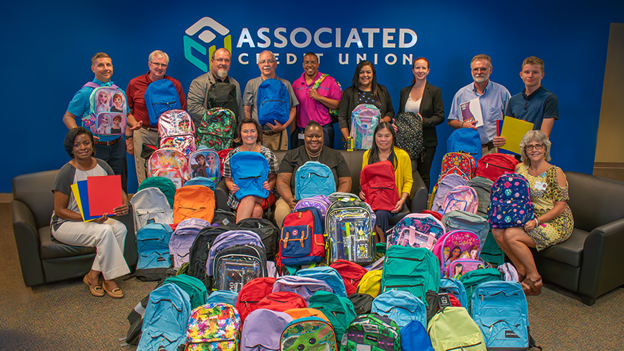 ACU Employees with Donated School Supplies