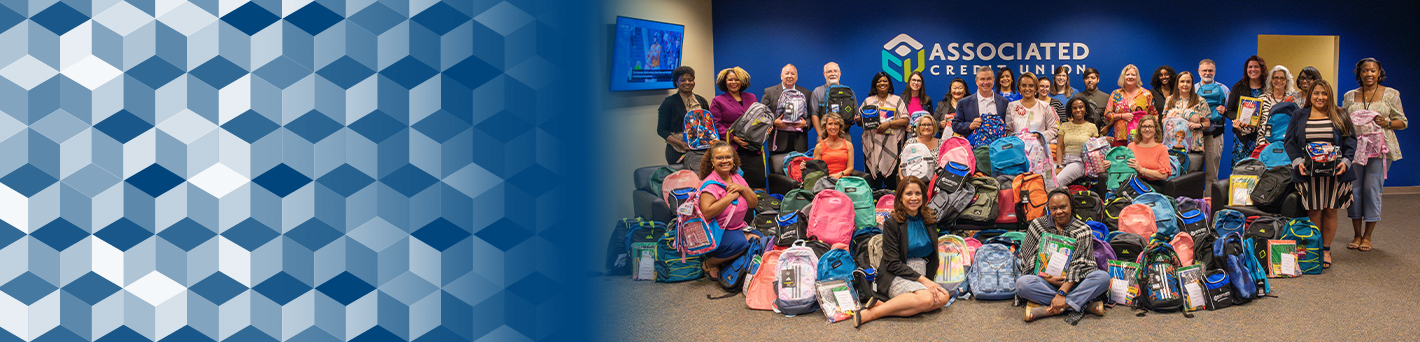 Group photo of ACU employees and service event