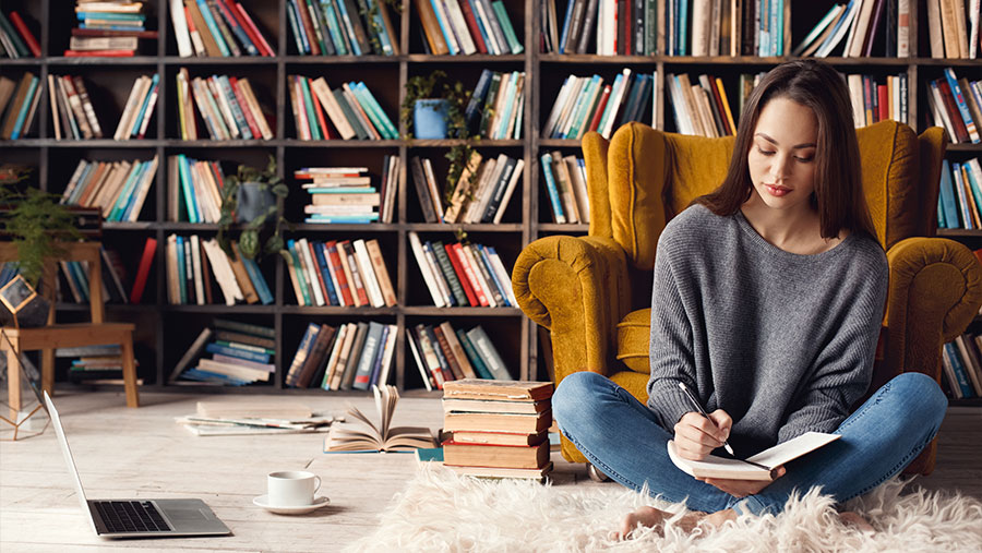 Girl writing in notebook