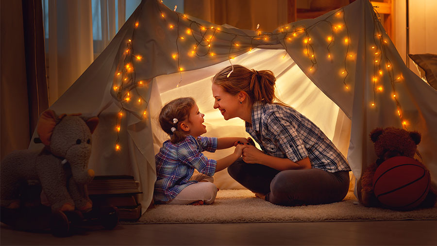 Mather and daughter in home fort