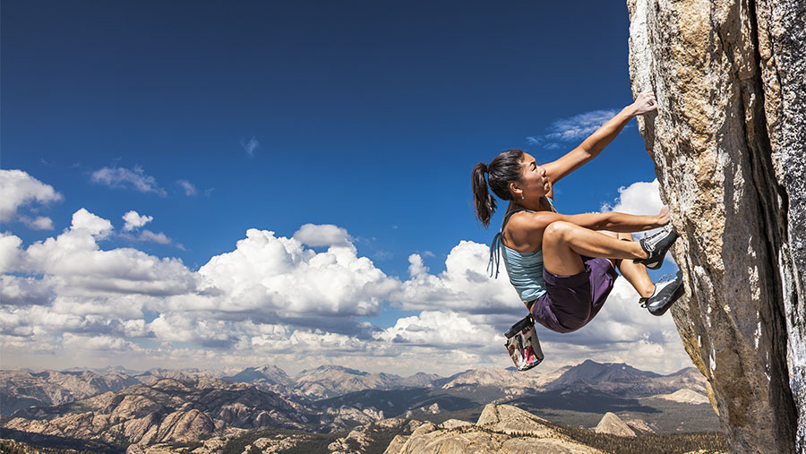 Woman rock climbing