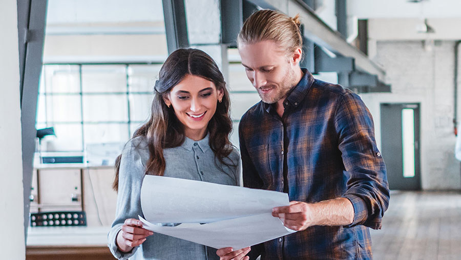 People at work looking at a document