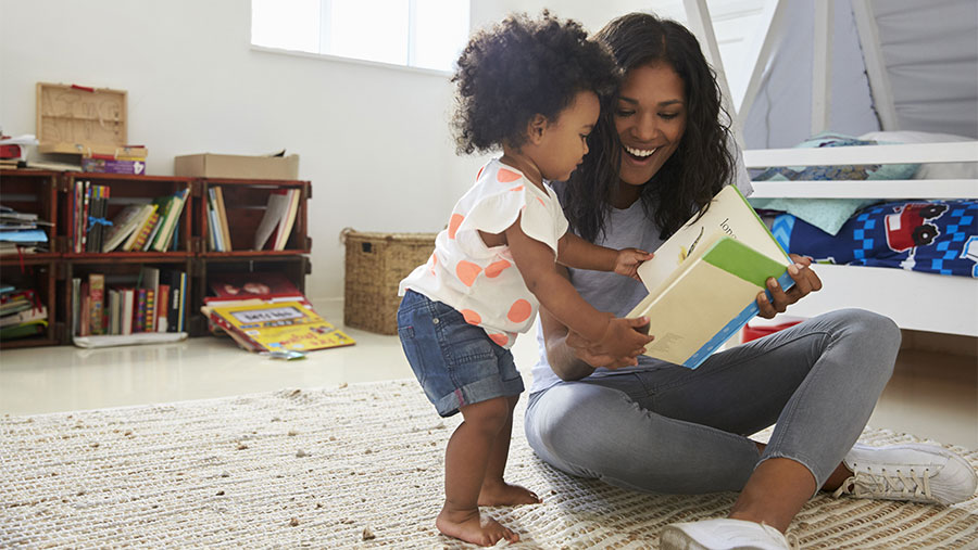 Mother and daughter reading a book