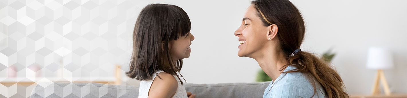 Mother and daughter looking at each other